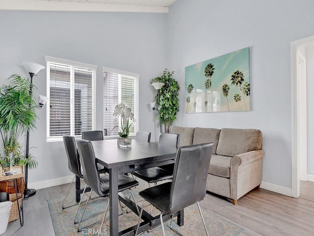 dining space featuring light hardwood / wood-style flooring