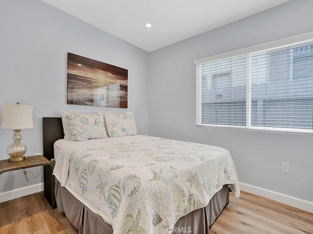 bedroom featuring light hardwood / wood-style floors