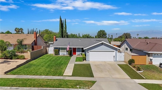 single story home with a front lawn and a garage