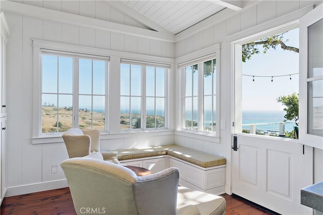 sunroom / solarium featuring wood ceiling, a water view, a healthy amount of sunlight, and lofted ceiling