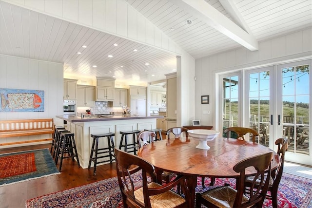 dining room featuring dark wood-type flooring, wooden ceiling, beam ceiling, and recessed lighting
