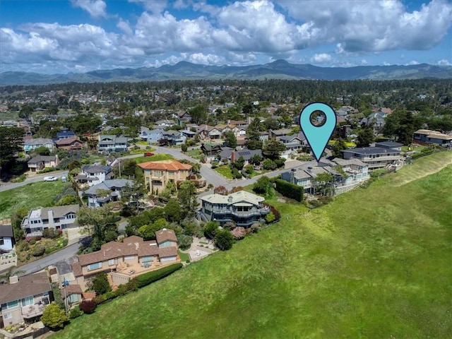 drone / aerial view with a mountain view and a residential view