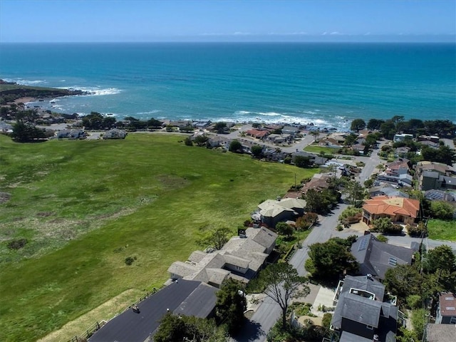 bird's eye view featuring a water view and a residential view