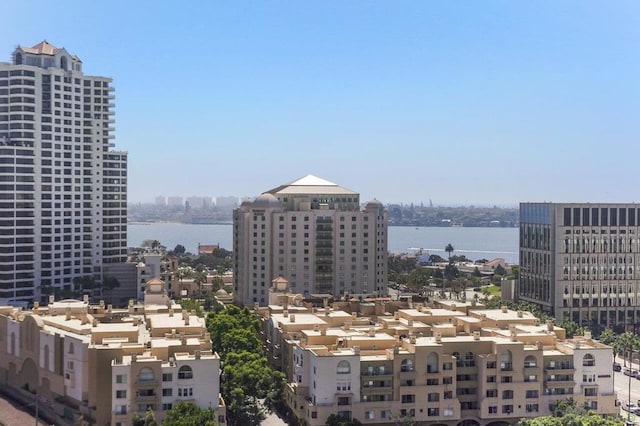 property's view of city featuring a water view