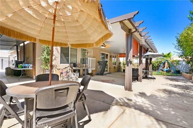 view of patio featuring a playground