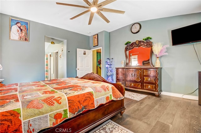 bedroom featuring wood-type flooring and ceiling fan