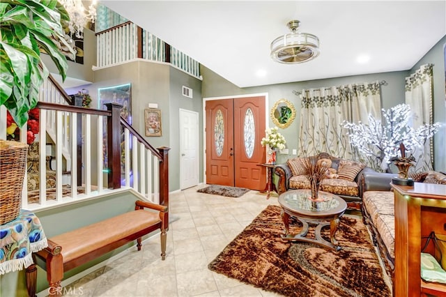 foyer entrance featuring light tile patterned floors