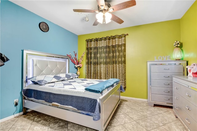 bedroom featuring ceiling fan and light tile patterned floors