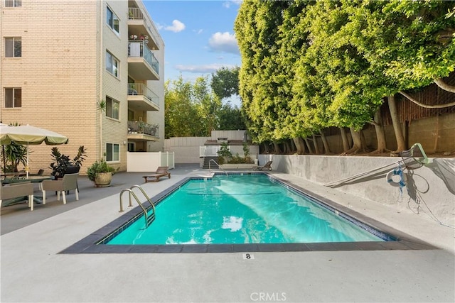 view of pool with a patio