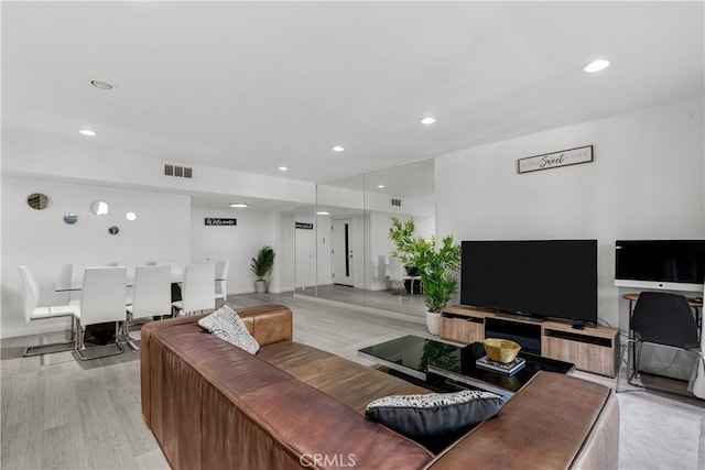 living room featuring light wood-type flooring