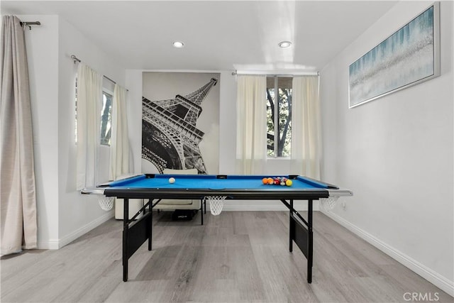 playroom with light hardwood / wood-style flooring and billiards