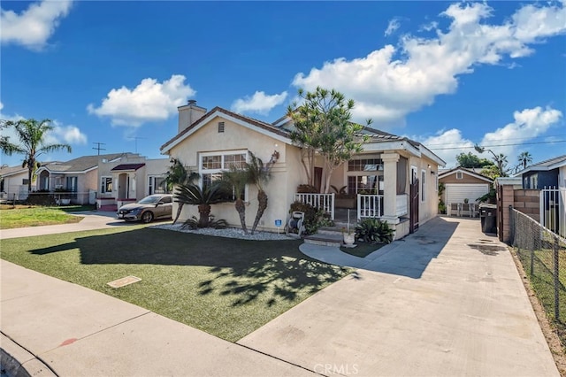 view of front of home with a porch and a front lawn