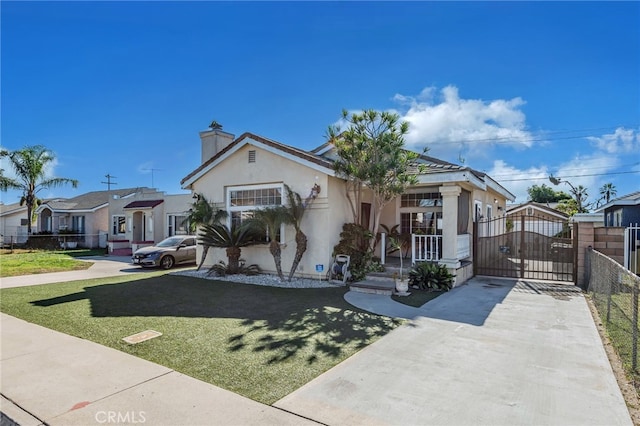 view of front of property with a front lawn