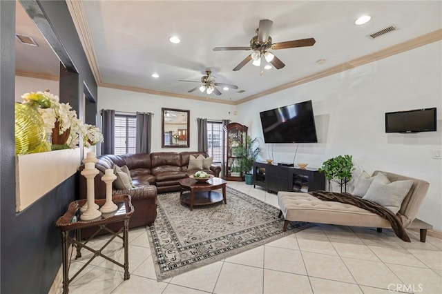 tiled living room featuring ceiling fan and ornamental molding