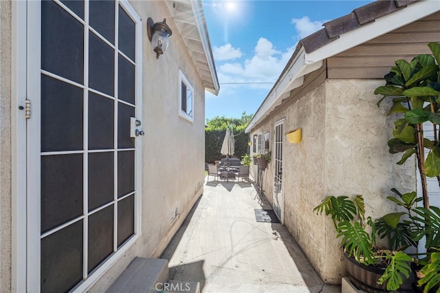 view of home's exterior featuring a patio area