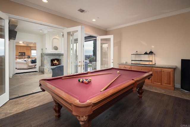 game room featuring a fireplace, french doors, ornamental molding, and billiards