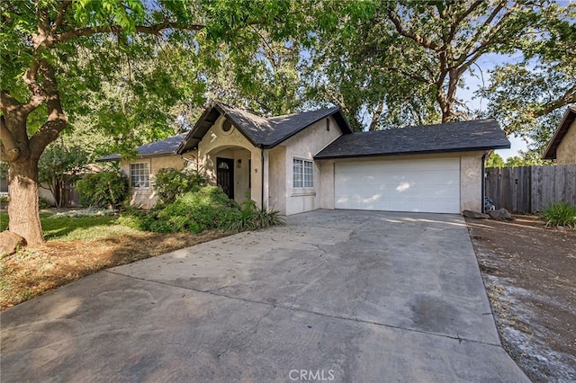 ranch-style home with a garage