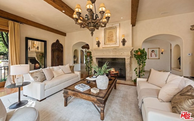 living room featuring beam ceiling, a notable chandelier, and light tile patterned flooring