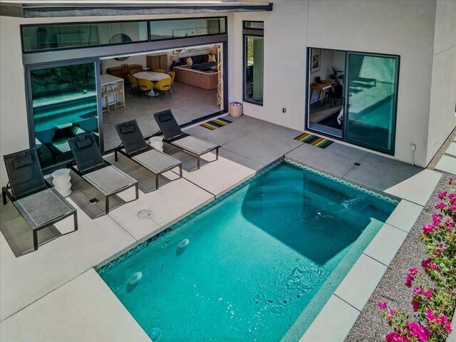 view of pool with a patio