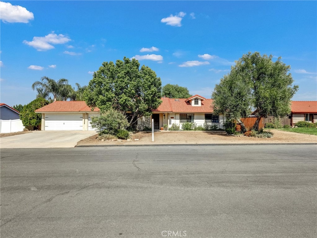 ranch-style house featuring a garage