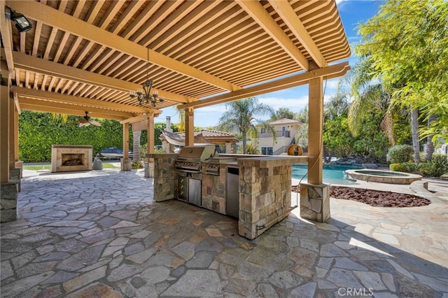 view of patio with exterior kitchen, ceiling fan, a grill, and a pool with hot tub