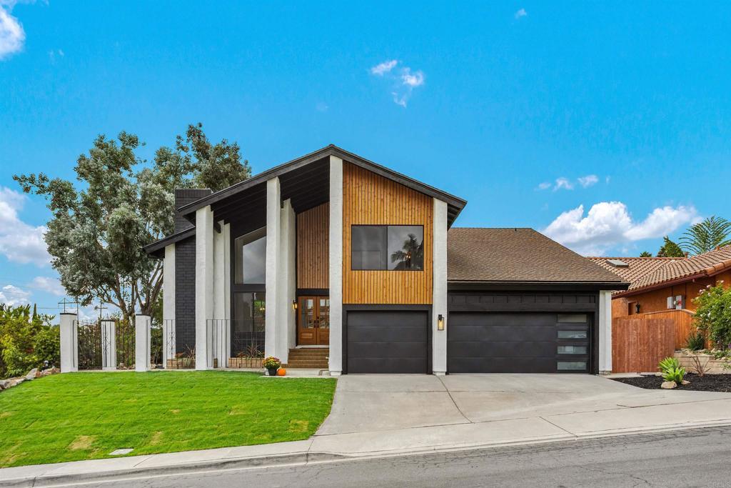 contemporary house featuring a front yard