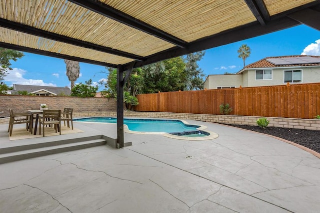 view of swimming pool featuring a patio area