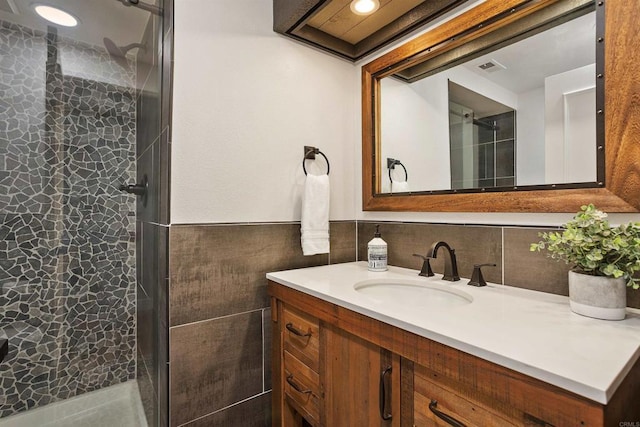 bathroom featuring vanity and walk in shower