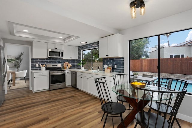 kitchen featuring white cabinetry and stainless steel appliances