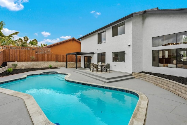 view of swimming pool featuring a patio area