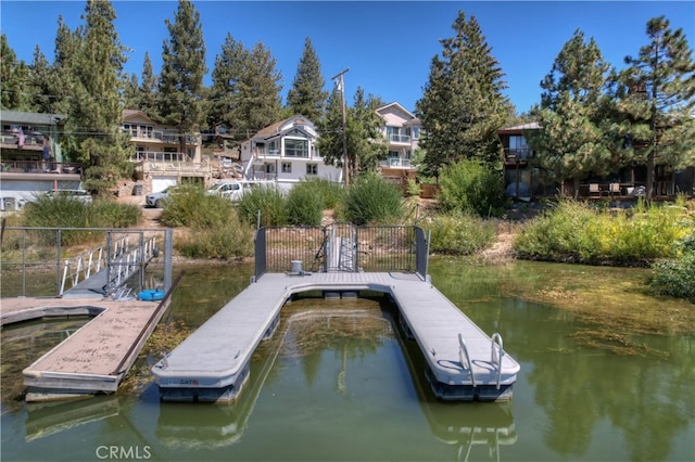 dock area featuring a water view