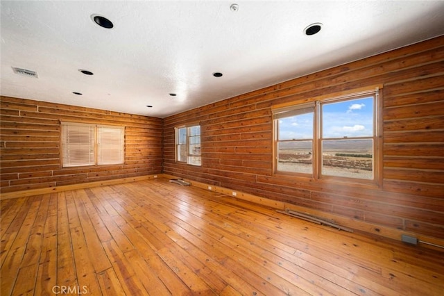 23610 W Lancaster Rd, Lancaster, CA 93536 - empty room with wood-type flooring, recessed lighting, and visible vents