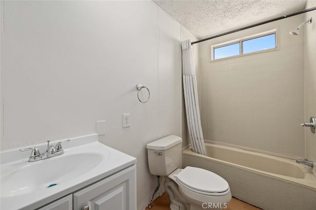 23610 W Lancaster Rd, Lancaster, CA 93536 - full bathroom with vanity, toilet, a textured ceiling, and shower / tub combo with curtain