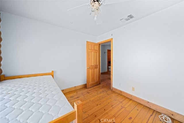 23610 W Lancaster Rd, Lancaster, CA 93536 - bedroom with baseboards, visible vents, ceiling fan, and light wood-style floors