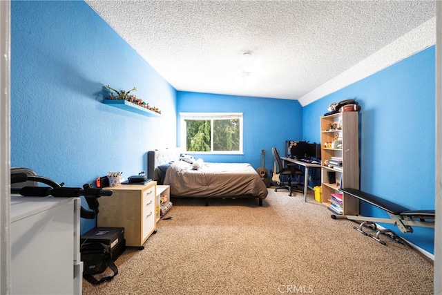 carpeted bedroom with a textured ceiling and lofted ceiling