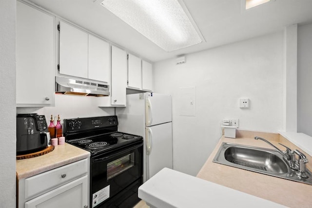 kitchen featuring ventilation hood, black electric range oven, sink, and white cabinetry