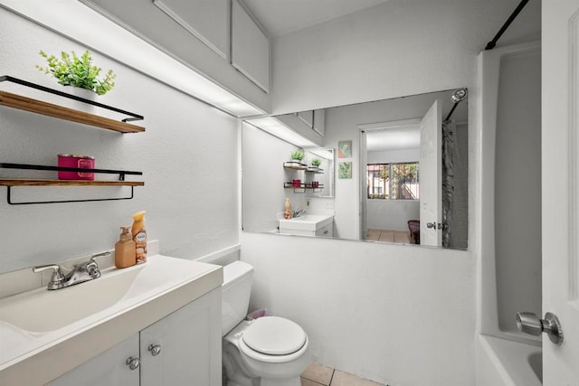 full bathroom featuring shower with separate bathtub, tile patterned floors, vanity, and toilet