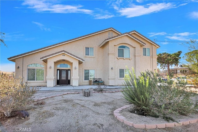 view of front of house with a patio