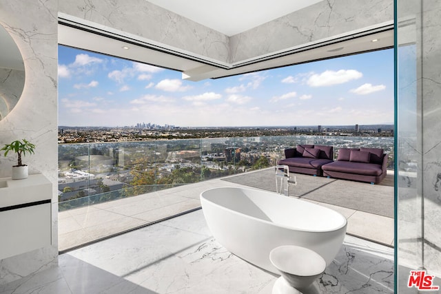 bathroom featuring a tub to relax in