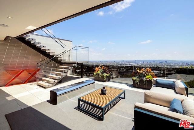 view of patio with a balcony