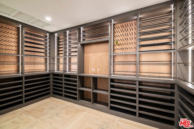 wine cellar featuring light parquet floors