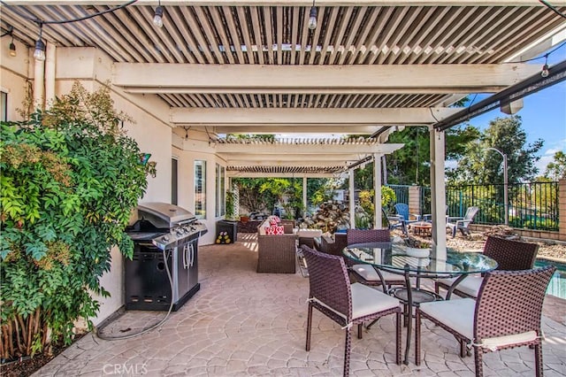 view of patio / terrace featuring a pergola and grilling area