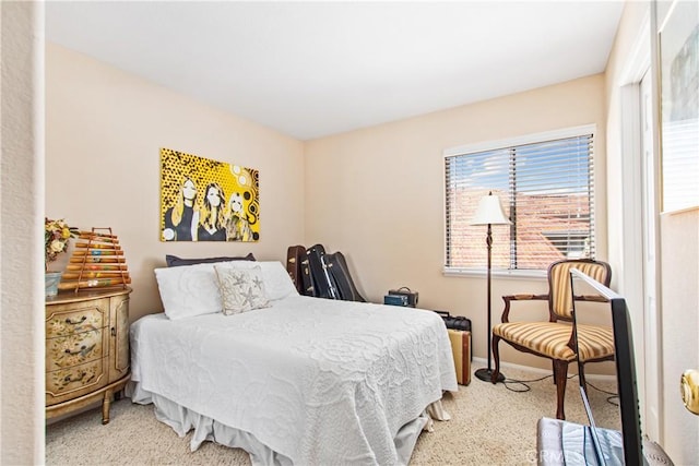 bedroom with light colored carpet