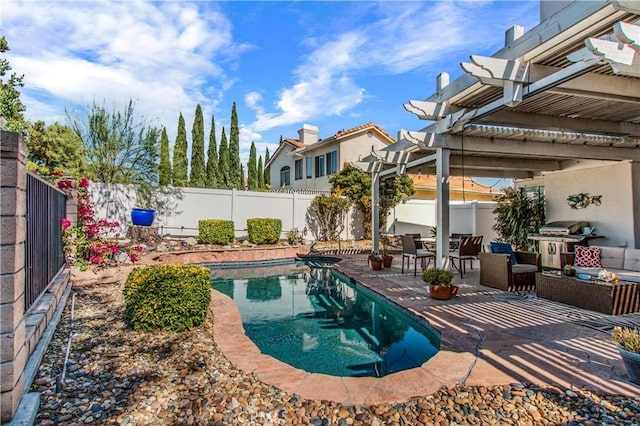 view of swimming pool featuring a grill, a patio area, and a pergola