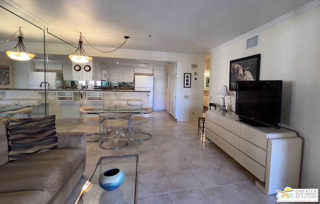 tiled living room featuring crown molding