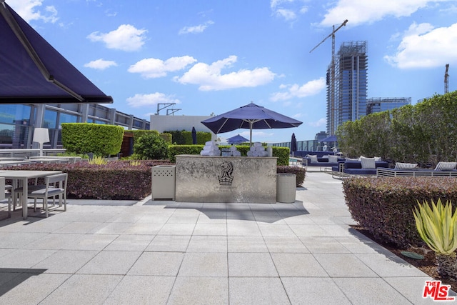 view of patio / terrace with an outdoor hangout area and area for grilling