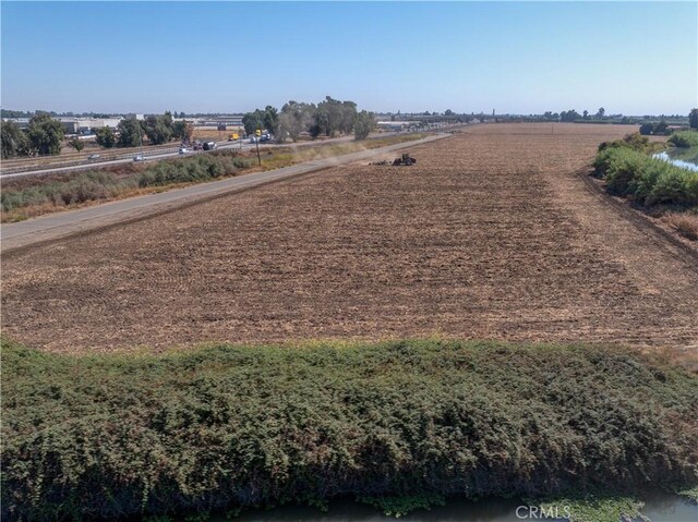 exterior space with a water view and a rural view