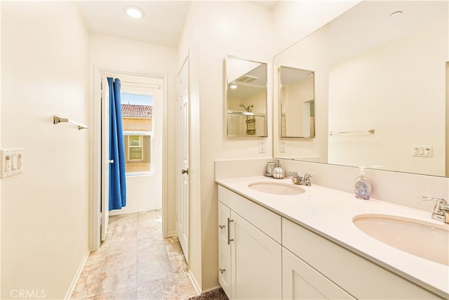 bathroom featuring vanity