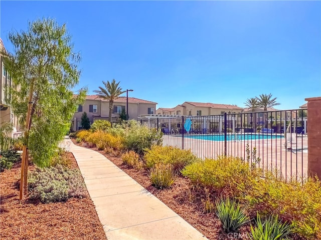 view of property's community featuring a pool