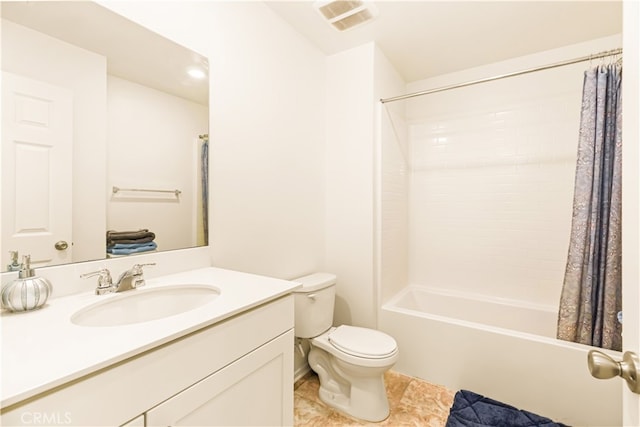 full bathroom featuring vanity, tile patterned flooring, toilet, and shower / tub combo with curtain